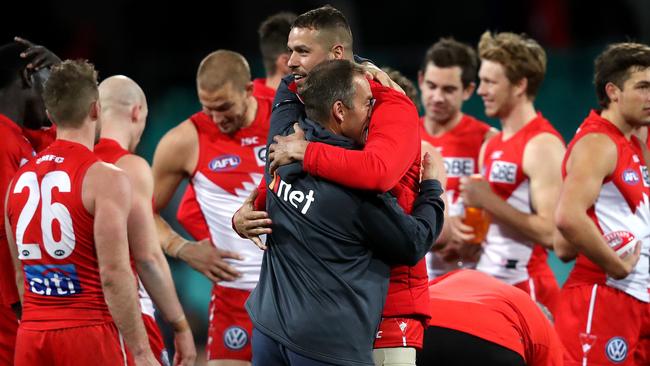 Franklin hugs former coach Alastair Clarkson after the game. Picture: Phil Hillyard