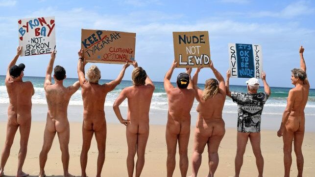 Beachgoers shed their clothes at Tyagarah Beach earlier this year to keep their beach clothing-optional. Picture: Jasmine Burke