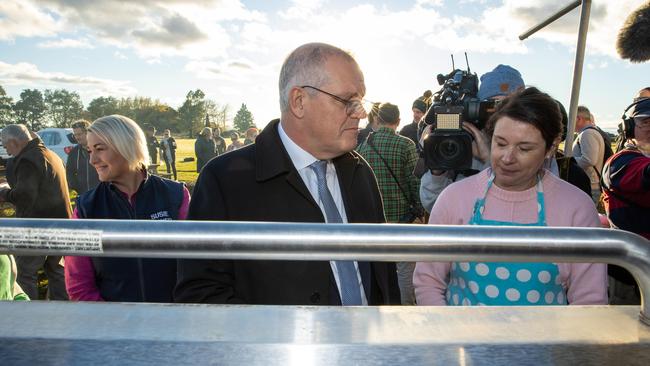 Prime Minister Scott Morrison attends a community BBQ breakfast at the Whitemore Tennis Club in Northern Lyons. Picture: Jason Edwards