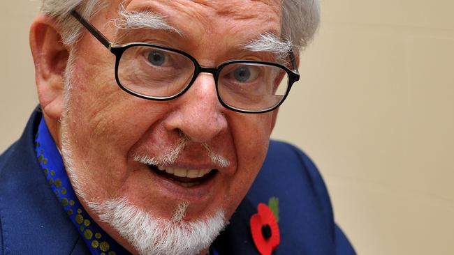 FILE - APRIL 19, 2013: The Sun tabloid newspaper in Britain is reporting that Australian entertainer, Rolf Harris was arrested in March, in relation to sex abuse claims. The Sun is claiming that Harris was arrested as a result of Operation Yewtree, the investigation into the Jimmy Savile sex abuse scandal. LONDON - NOVEMBER 7: Australian broadcaster and artist Rolf Harris holds the Officer of the Order of Australia, presented by the High Commissioner John Dauth, at Australia House on November 7, 2012 in London, England. (Photo by John Stillwell - WPA Pool/Getty Images)