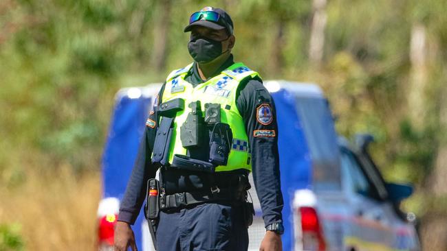 NT Police man a checkpoint at Acacia on the Stuart Highway on June 29, 2021 on Day 2 of the lockdown of the greater Darwin region. Picture: Glenn Campbell