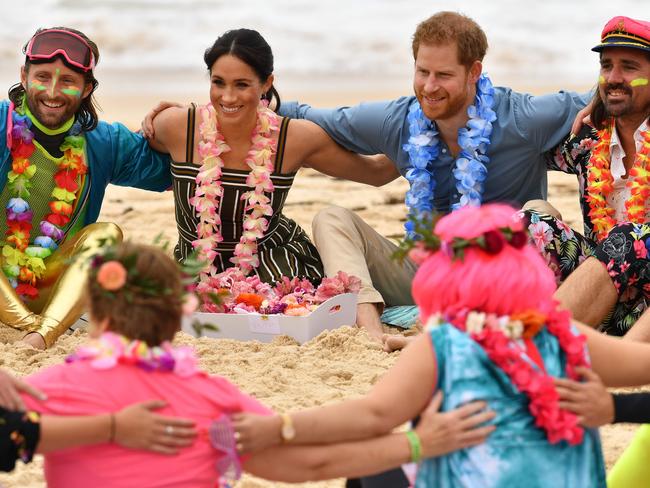 Harry and Meghan joined a "Fluro Friday" session run by OneWave at Bondi Beach. Picture: Saeed Khan/AFP