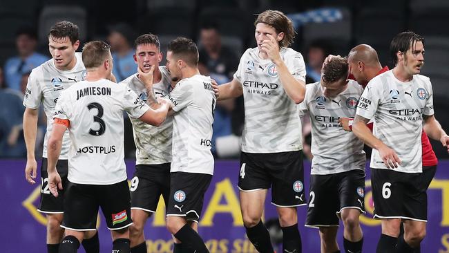 SYDNEY, AUSTRALIA - NOVEMBER 22: Jamie Maclaren of Melbourne City FC celebrates with team mates after scoring the final goal during the round 7 A-League match between the Western Sydney Wanderers and Melbourne City at Bankwest Stadium on November 22, 2019 in Sydney, Australia. (Photo by Matt King/Getty Images)