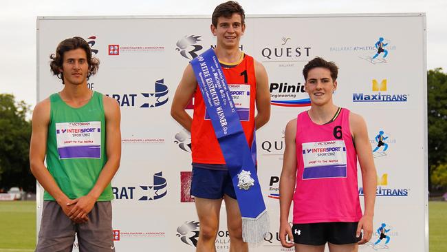 Mount Gambier teenager Hayden Crowe (centre) receiving his sash for the 400m restricted race event at Ballarat last year before going pro. Picture: Supplied