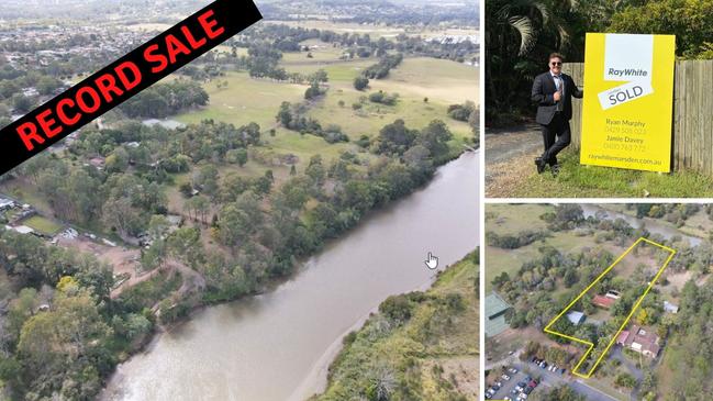 Real estate agent Ryan Murphy outside the Logan riverfront property which broke sales records.