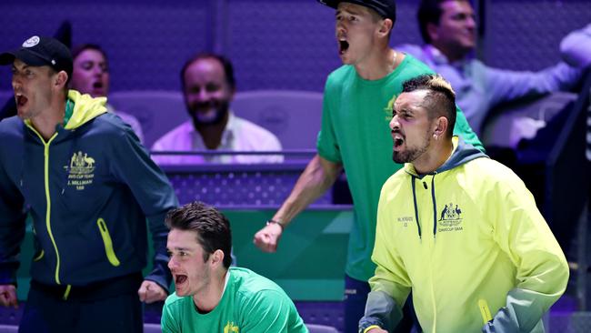 Nick Kyrgios and Team Australia cheer on their teammates in the quarter final doubles match. Pic: Getty Images