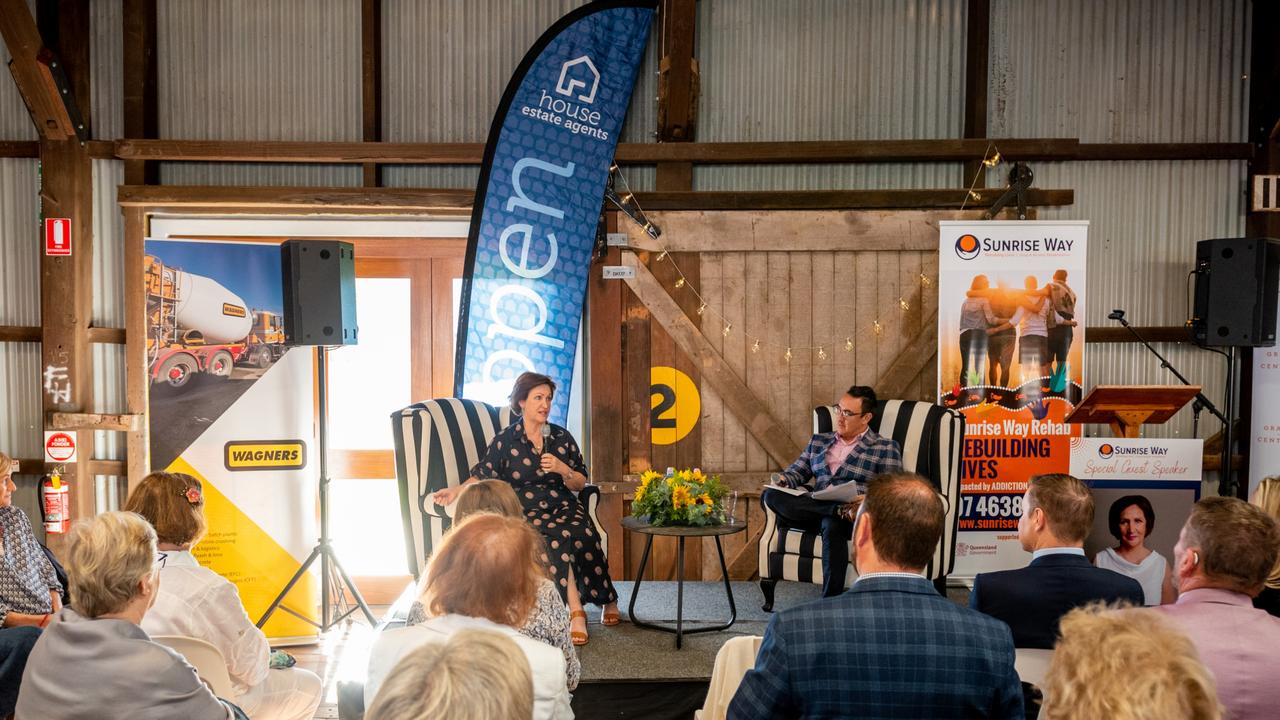 Guest speaker at the Sunrise Way Resilience Breakfast Mary Li addresses the crowd at the Railway Goods Shed with MC Cr James O'Shea.