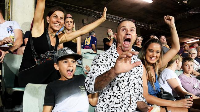 Kitty Kat, Henry, Matt Mulga and Bree Richards cheering at 2019 Melbourne Demons vs. Adelaide Crows AFL match at Darwin’s TIO Stadium. Picture: Keri Megelus