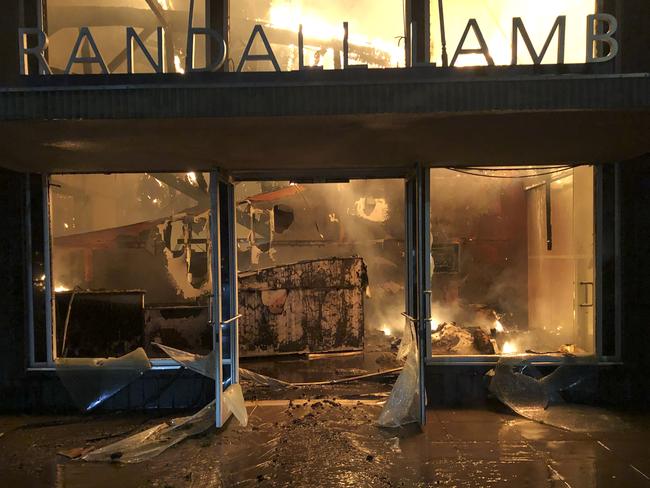 A building burns during a protest in La Mesa, California. Picture: AP