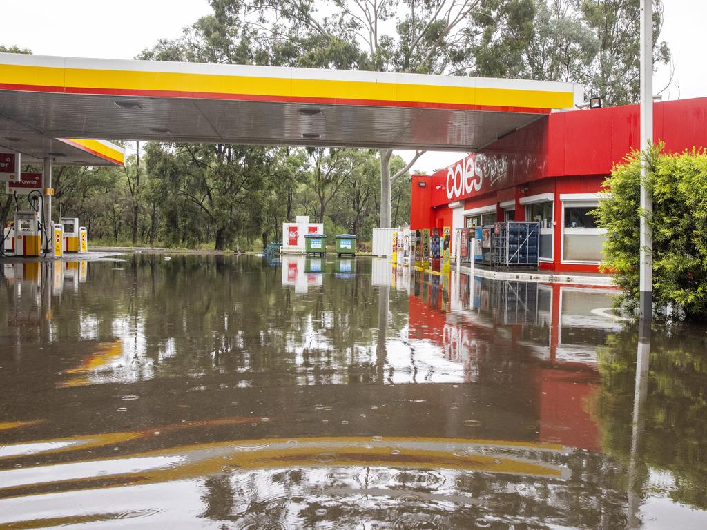 A flooded petrol station is seen near Windsor in Sydney. Picture: Jenny Evans