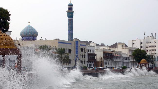 High waves break on the sea side promenade in the capital Muscat on October 2. Picture: Mohammed Mahjoub/AFP