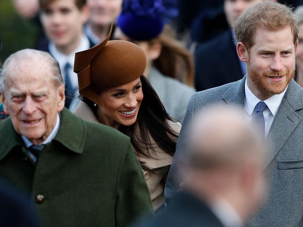 Prince Philip, Meghan and Harry were all smiles last year.