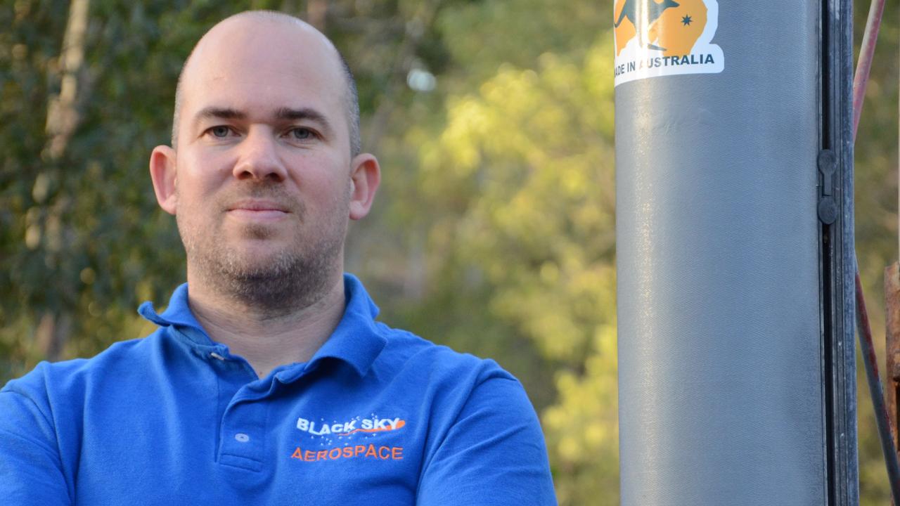 Black Sky Aerospace CEO Blake Nikolic and the rocket as it is prepared for launch this weekend. Picture: Supplied