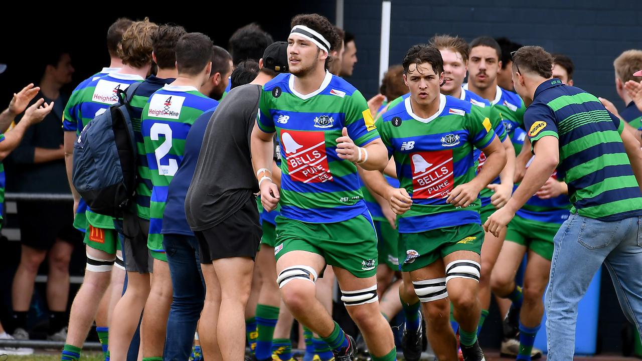 GPS players run onto the field Colts 1 between GPS v Brothers Saturday April 23, 2022. Picture, John Gass