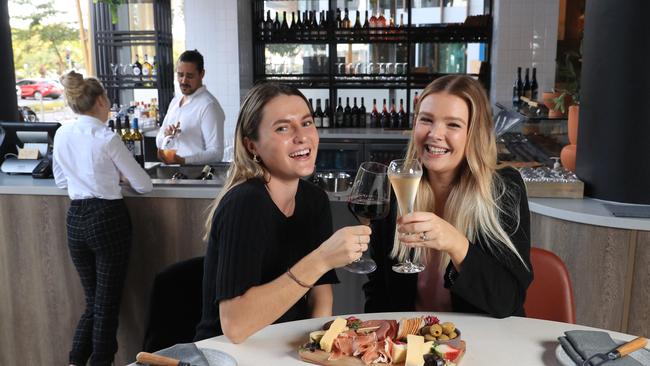 Crystalbrook Bailey has opened a new boutique wine bar called Arte. Food and beverage manager Tiago Teixeira serves an organic wine to Laura Clark, while Jamie Binder and Jodie Walsh enjoy a drink and a charcuterie board together. Picture: Brendan Radke