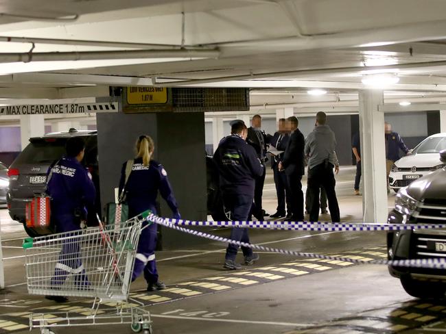 An AFP police officer was injured and another fired a shot at an escaping suspect during a police operation in the carpark of Strathfield Plaza shopping centre. Picture: Toby Zerna