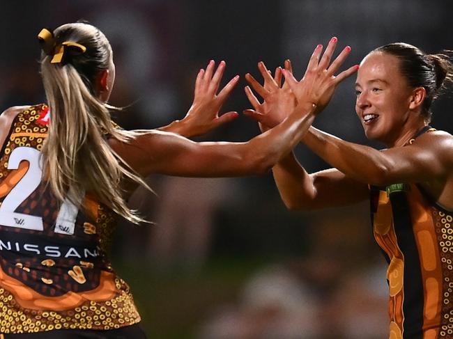 CAIRNS, AUSTRALIA - OCTOBER 24: Jasmine Fleming of the Hawks celebrates kicking a goal during the round nine AFLW match between Hawthorn Hawks and Narrm (Melbourne Demons) at Cazaly's Stadium, on October 24, 2024, in Cairns, Australia. (Photo by Albert Perez/AFL Photos via Getty Images)