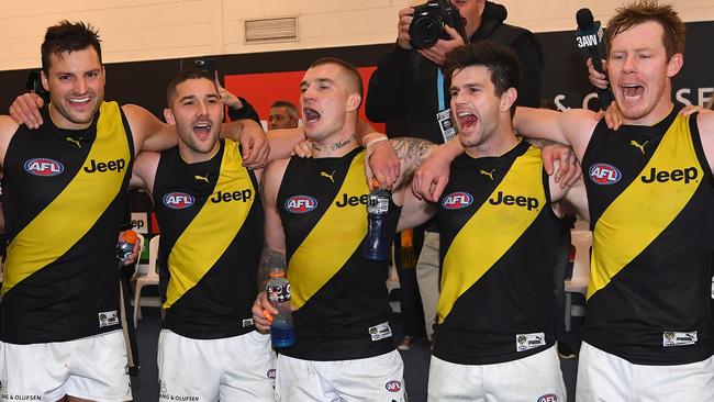 (from left) Toby Nankervis, Shaun Grigg, Dustin Martin, Trent Cotchin and Jack Riewoldt sing the song after a Richmond win this season.