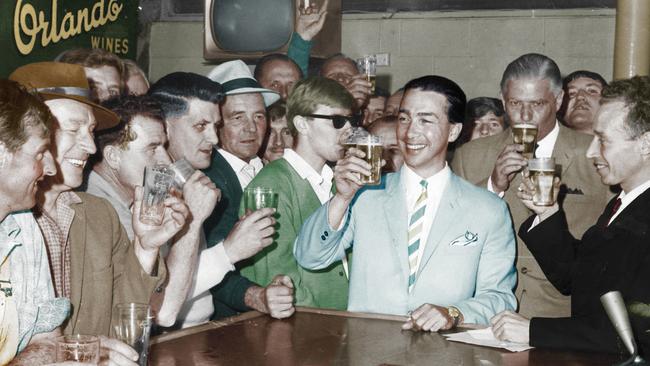 Premier Don Dunstan drinking beer at Challa Gardens Hotel to celebrate end of six o’clock closing.