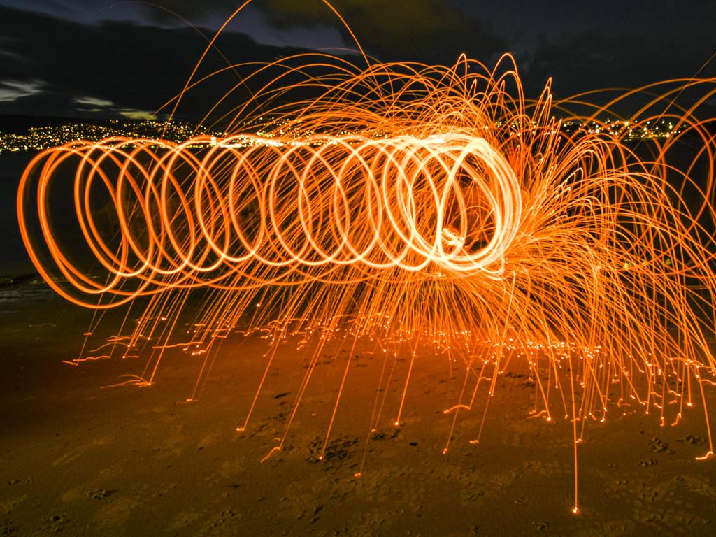 Reader picture for your Focus on Tasmania. Steel wool photography on Bellerive Beach. Picture: Neville Hodges ***ONE TIME USE ONLY***