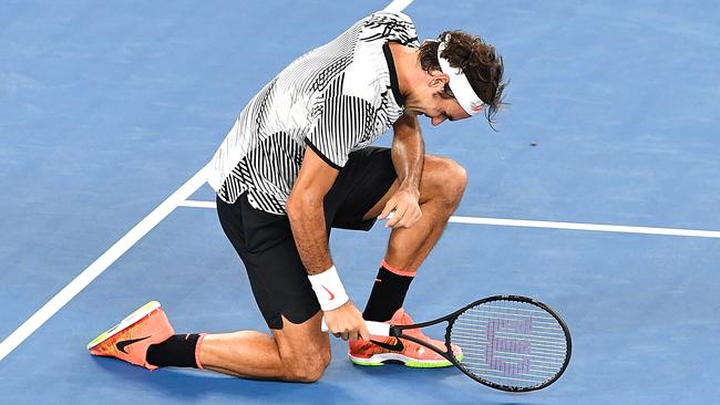 Roger Federer of Switzerland takes in his Australian Open win.
