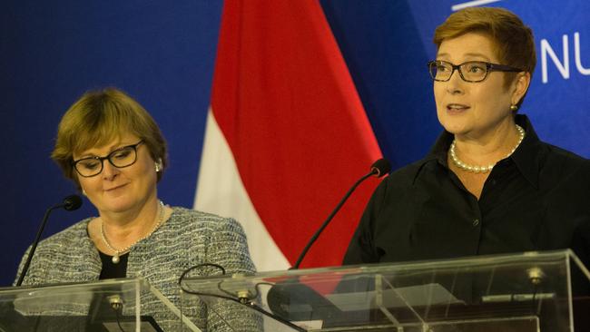 Linda Reynolds, left, and Marise Payne have made conflicting statements about the cost of Australia’s submarine contract with the French. Picture: Graham Crouch