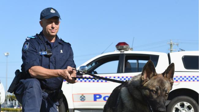 Sergeant Ian Grigoris with Rambo. Photo: Robyne Cuerel / Fraser Coast Chronicle