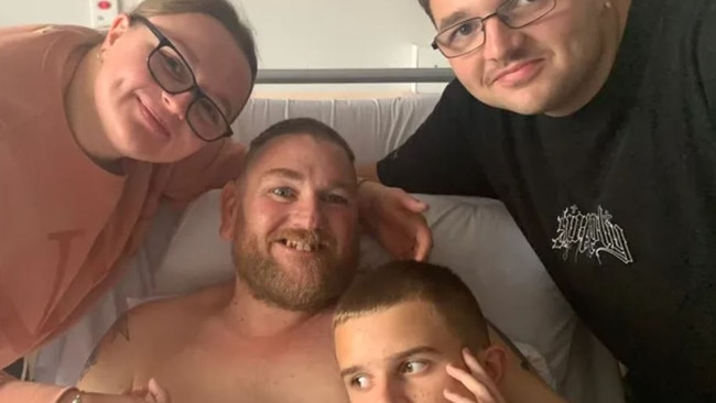 The Madden children (Makensie, far left), have not left their dad Nathan's bedside since he had a fall at work and doctors found out he has cancer in his brain, lungs and kidneys. Pictures: GoFundMe/Supplied.