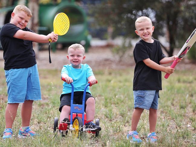 Josh with brothers Zachary and Noah. Picture: Hamish Blair