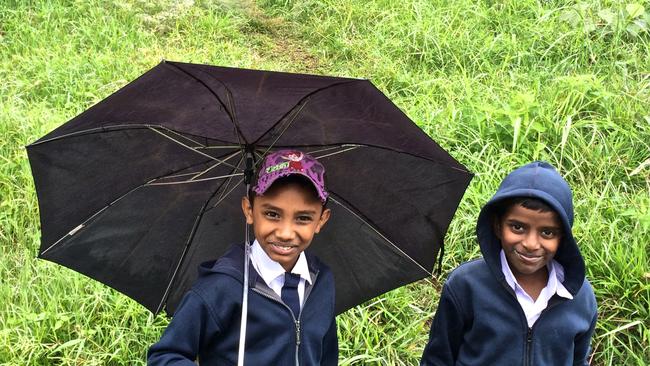 Haputale boys make their way to school. Picture: Kendall Hill