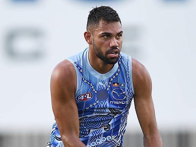 DARWIN, AUSTRALIA - JUNE 04: Tarryn Thomas of the Kangaroos in action during the 2022 AFL Round 12 match between the Gold Coast Suns and the North Melbourne Kangaroos at TIO Stadium on June 04, 2022 in Darwin, Australia. (Photo by Felicity Elliott/AFL Photos via Getty Images)