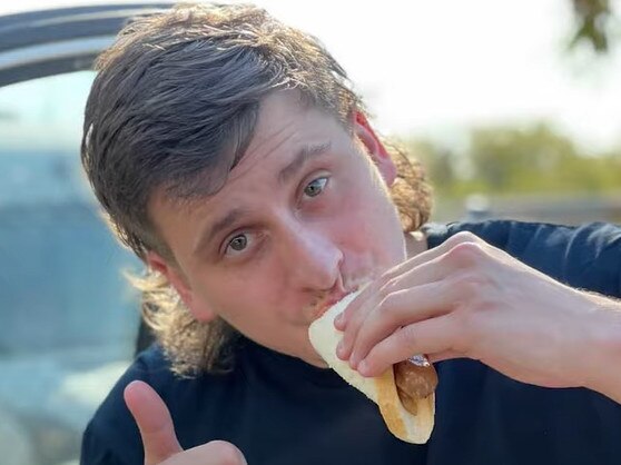 Josh Eastwell is travelling around Australia to eat a snag at every Bunnings store. Picture: Sportsbet via NCA NewsWire