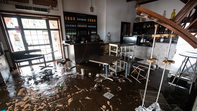 Enzo's Restaurant in Camden as co-owner Rina Maruzza returns to the premises and sees the flood damage for the first time.