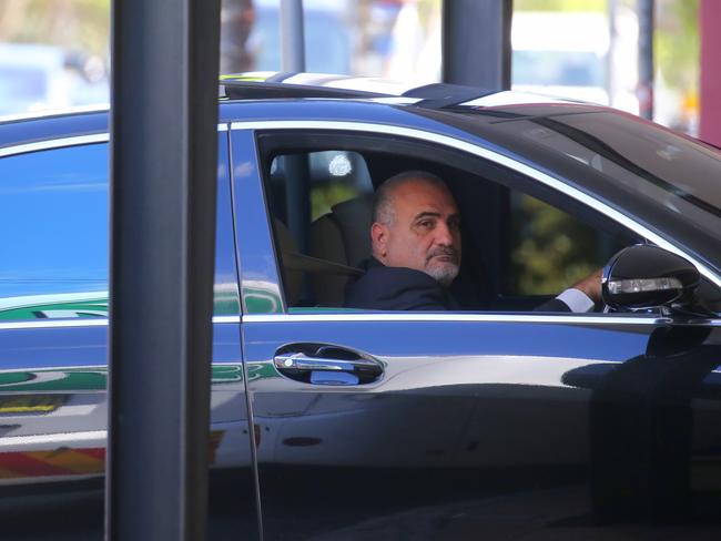 A black Mercedes arrives for the funeral of Pasquale Barbaro.