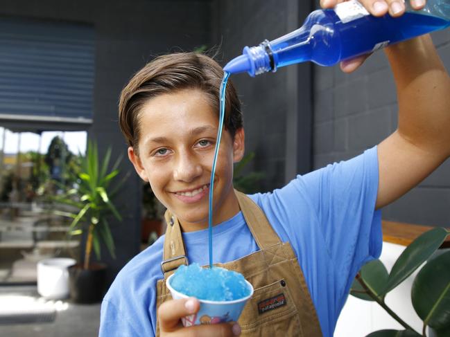 14 year old Jonah Angel with his snow cone machine. Picture: Tertius Pickard