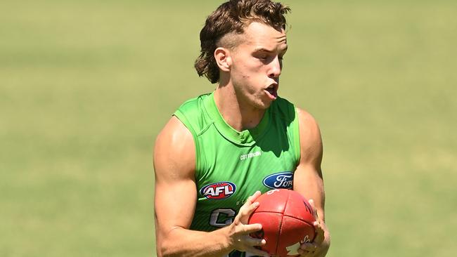 Francis Evans in action during Geelong training at Southport.