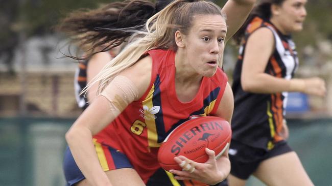 Round One of the 2019 NAB AFLW Under-18 Championships began today, Friday, May 31   at Peter Motley Oval, Unley, South Australia between South Australia and Northern Territory. SA's Hannah Munyard wins the ball again. Picture Dean Martin