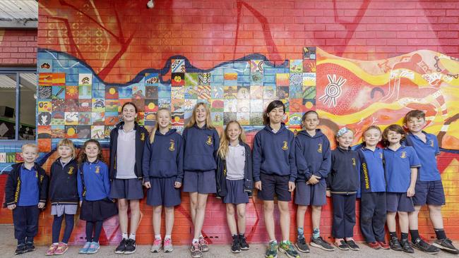 Warranwood Primary students with the school’s new mural. Photo: Daniel Pockett