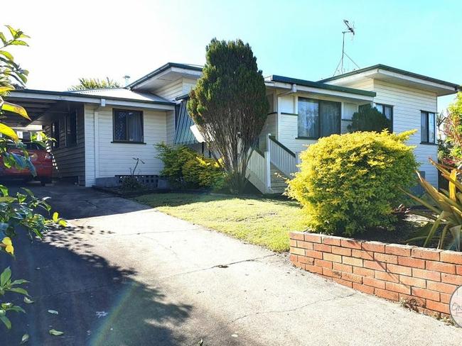 The home has three bedrooms, a single garage and a carport.