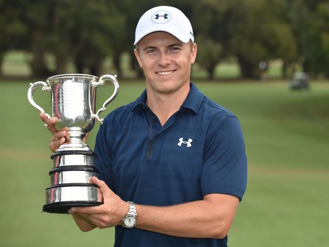 US golfer Jordan Spieth posing with the Stonehaven Cup after winning the 2016 Australian Open in Sydney. Picture: AFP/ Peter Parks