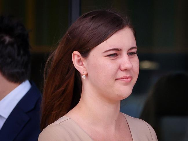 (FILES) In this file photo taken on October 14, 2022, Brittany Higgins leaves the ACT Magistrates Court in Canberra. - An Australian rape case that sparked national protests will not return to court after a mistrial, because of fears the intense public scrutiny could have a grave toll on the accuser's mental health, prosecutors said on December 2, 2022. (Photo by DAVID GRAY / AFP)