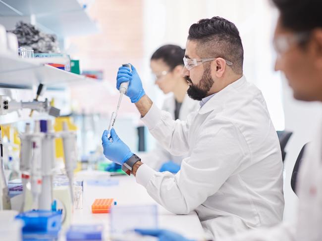 A supplied image obtained on Wednesday, February 12, 2020, of a scientist working in the lab of Biotech giant CSL, who has upgraded its full year profit guidance after recording an 11 per cent leap in first half net profit to $1.25 billion.. (AAP Image/Supplied by CSL) NO ARCHIVING, EDITORIAL USE ONLY