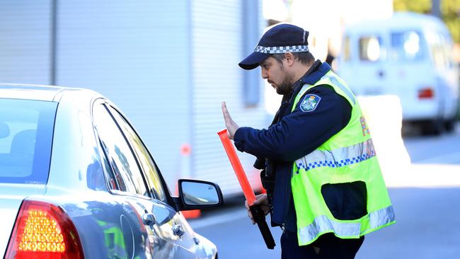 Police continue to patrol the border at Griffith Street, Coolangatta. Picture: Adam Head