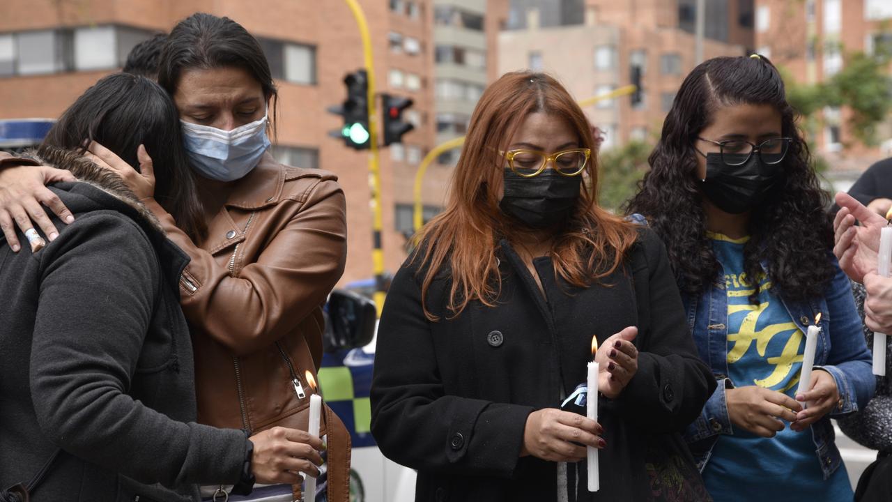 Fans light candles outside Casa Medina Hotel where Hawkins died. Picture: Guillermo Legaria/Getty