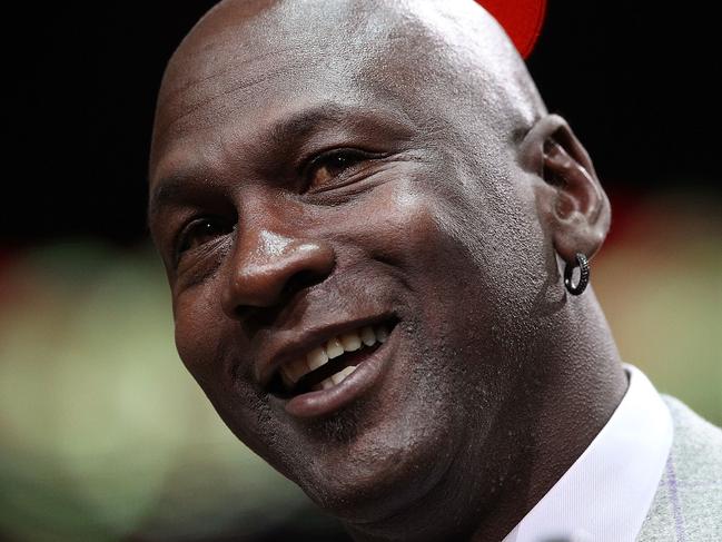 CHICAGO, IL - MARCH 12: Former player Michael Jordan of the Chicago Bulls addresses the crowd during a 20th anniversary recognition ceremony of the Bulls 1st NBA Championship in 1991 during half-time of a game bewteen the Bulls and the Utah Jazz at the United Center on March 12, 2011 in Chicago, Illinois. NOTE TO USER: User expressly acknowledges and agrees that, by downloading and/or using this photograph, User is consenting to the terms and conditions of the Getty Images License Agreement. (Photo by Jonathan Daniel/Getty Images)