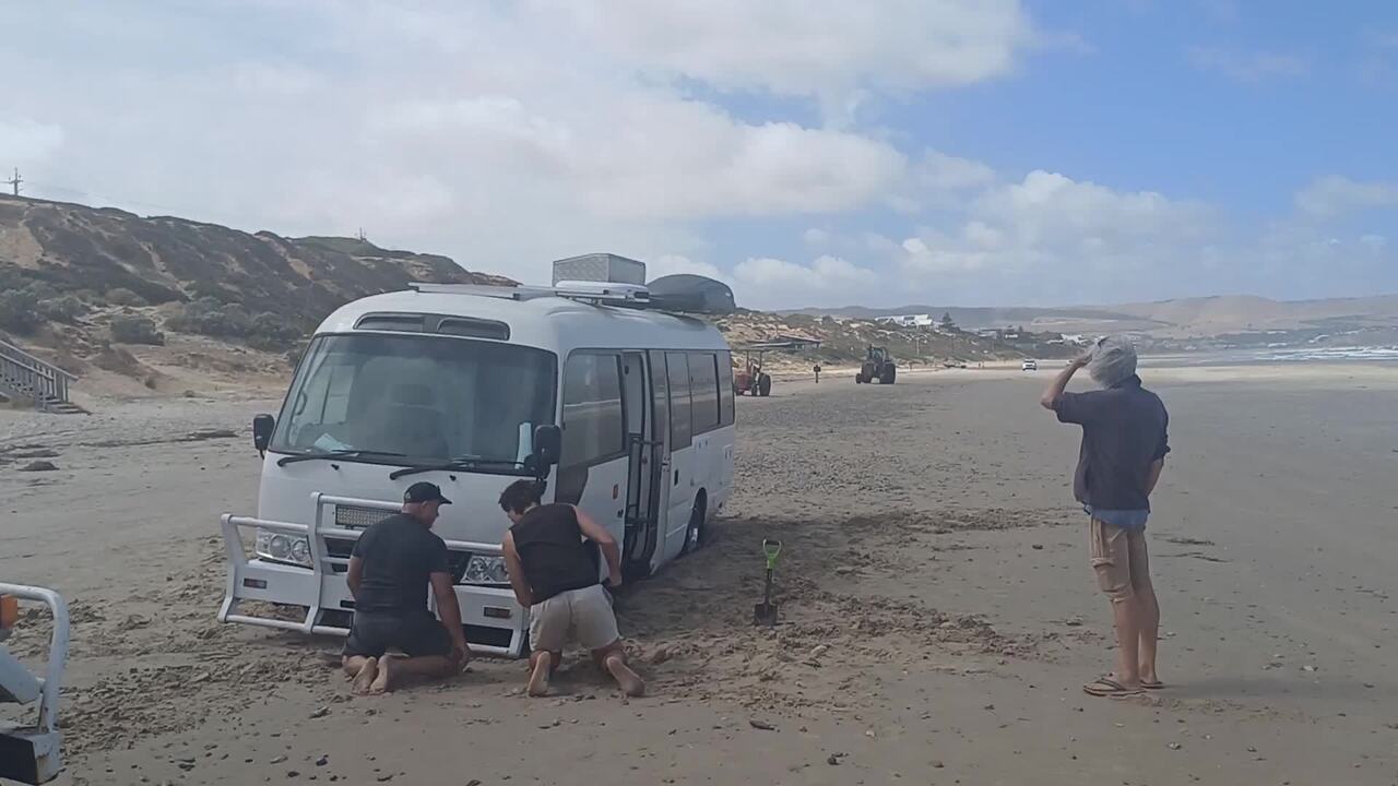 Shocked beachgoers find bus bogged on Aldinga Beach