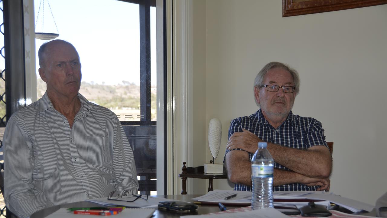 Member for Condamine Pat Weir (left) and retired scientist Ross Tinniswood listening to the concerns of trainers at this week's meeting.