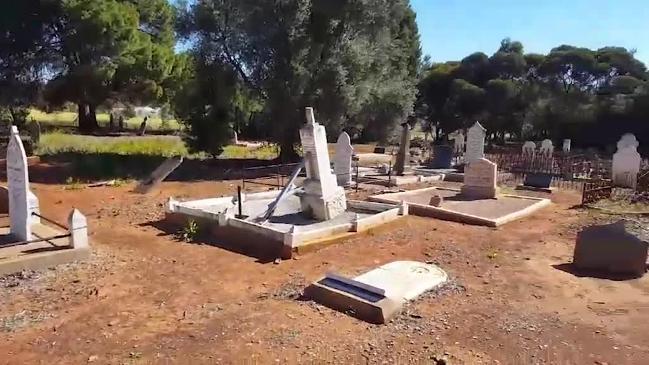 Dozens of headstones desecrated at Auburn cemetery