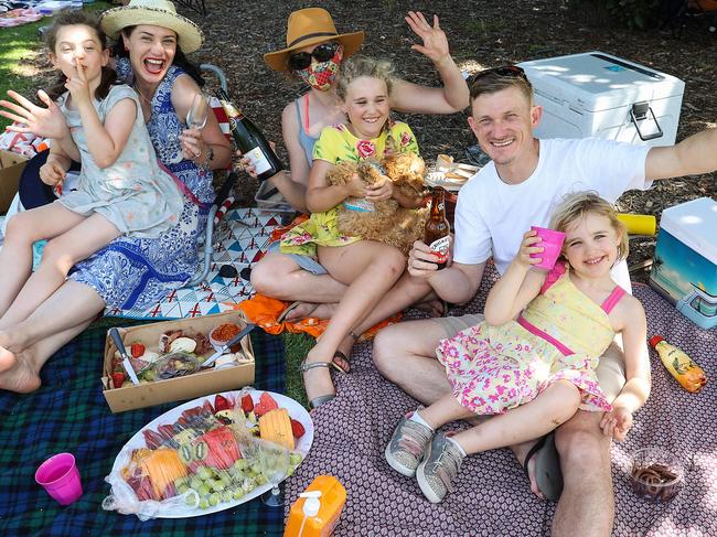 The Anderson family and Laura Cochrane enjoy a Cup Day picnic. Picture: Ian Currie/NCA NewsWire