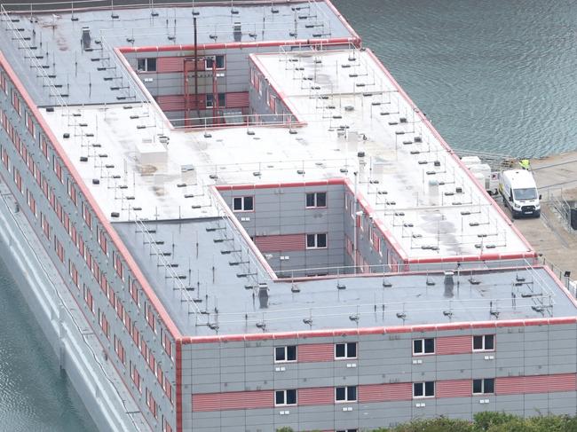 PORTLAND, ENGLAND - AUGUST 8: A general view of the Bibby Stockholm immigration barge on August 8, 2023 in Portland, England. Around 15 asylum seekers have boarded the Bibby Stockholm barge in Portland, Dorset. The Home Office's plan to accommodate up to 500 migrants faced challenges in placing an additional 20 individuals on board, reasons undisclosed. Protests were held at Portland Harbour on their arrival on August 8 in support of the migrants, offering welcome packs and contact details of support organizations. (Photo by Dan Kitwood/Getty Images)